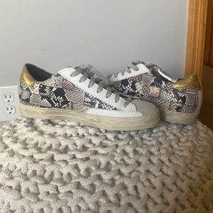 P448 worn a couple times. In great shape!